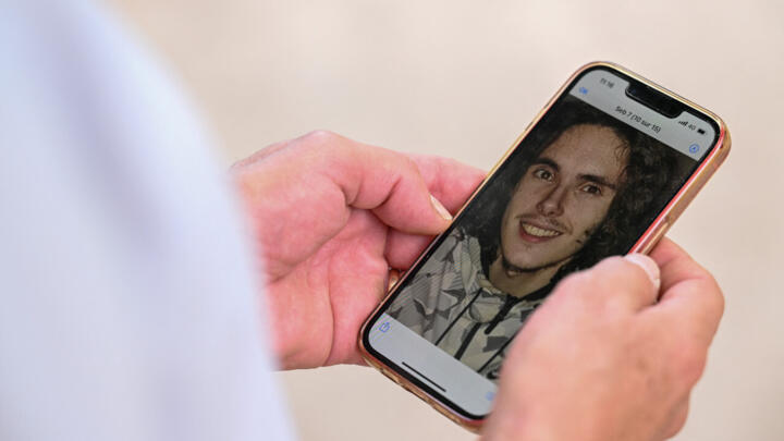 A photo of Frenchman Sebastien Raoult shown on his father's phone, August 1, 2022, Épinal, France.
